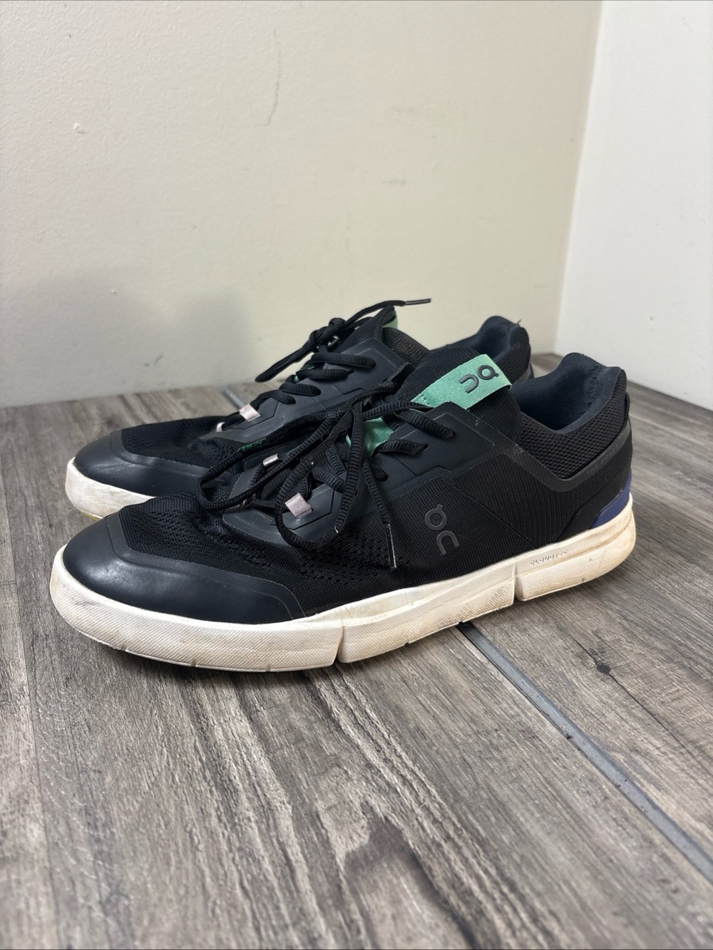 On Clouds Men's Black Sneakers with Mint Tongue Accent